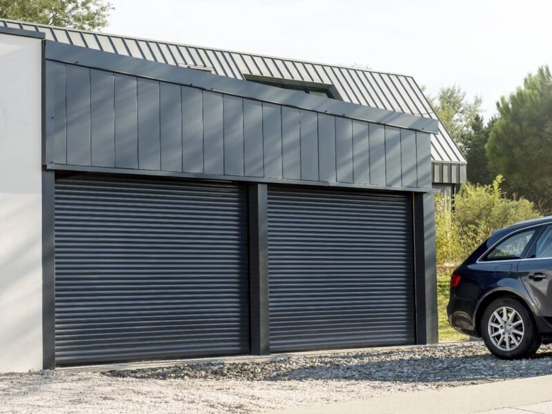 Car in front of a garage